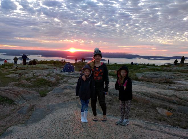 My daughters on top of Cadillac Mountain at sunrise
